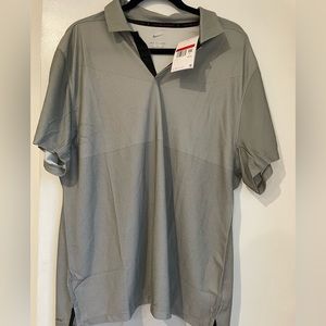 Never worn, Tiger Woods Collection golf polo. Size Large